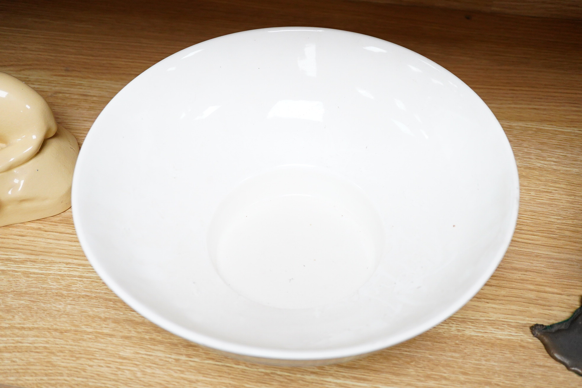 Keith Murray for Wedgwood, a large celadon footed bowl, stamped to the base, 28cm in diameter